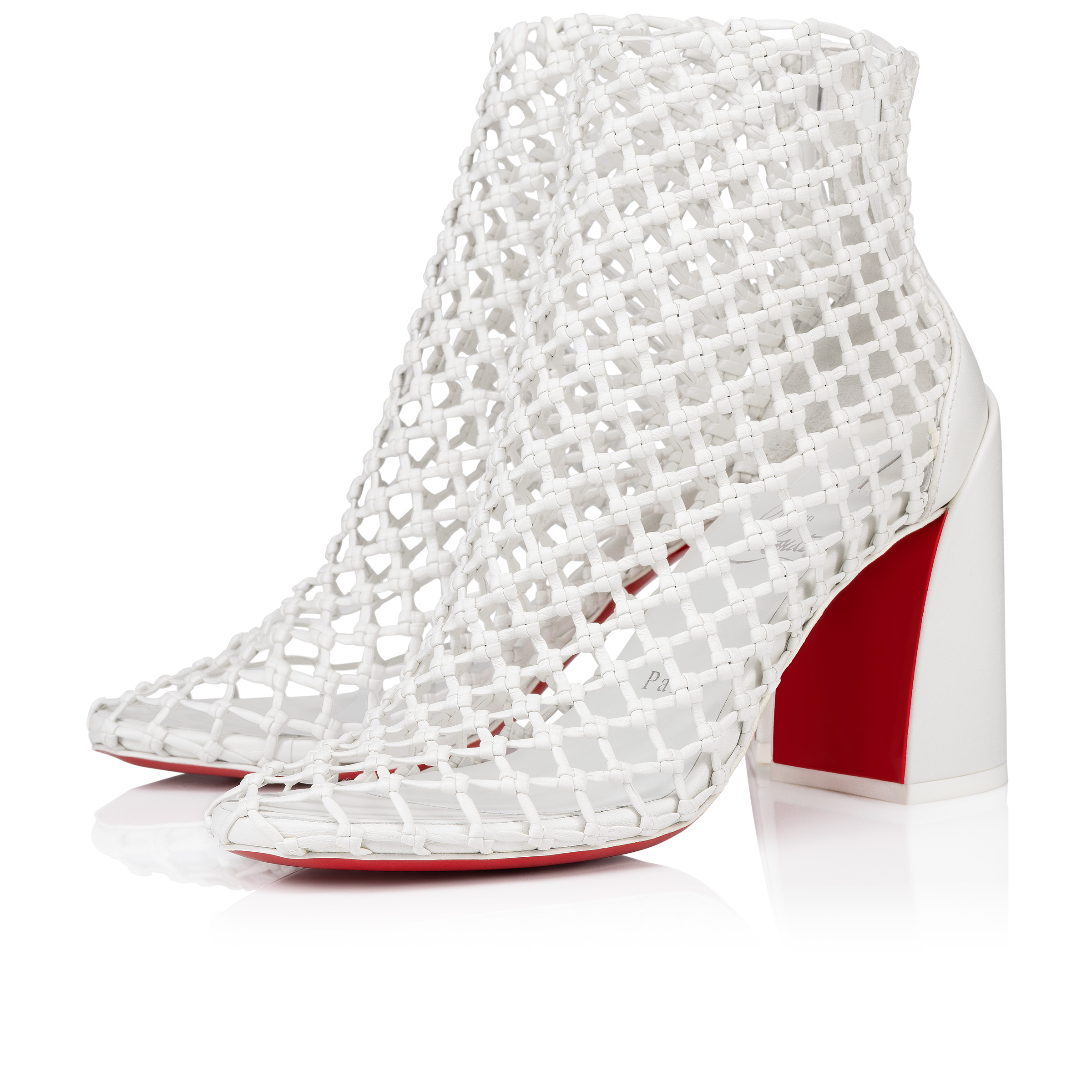 Louboutin white boots 2025
